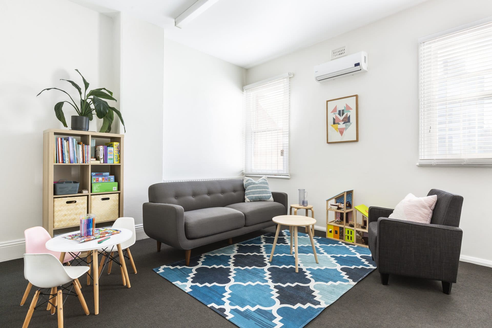 Inside Out Psychology therapy room – a welcoming space with comfortable seating and a children's play area